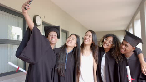 Diverse-group-of-graduates-celebrate-their-achievement