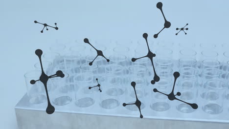Animation-of-molecules-moving-over-test-tubes