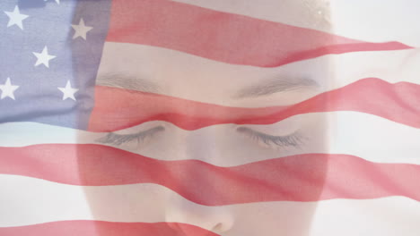Animation-of-american-flag-over-portrait-close-up-of-caucasian-woman-in-sunshine-opening-eyes