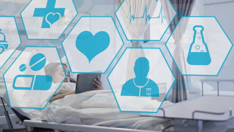 Animation-of-medical-icons-over-biracial-girl-using-tablet-on-bed-in-hospital