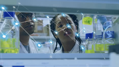 Animation-of-network-of-connections-over-diverse-scientists-working-in-lab