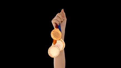 -Hands-throwing-some-medals-