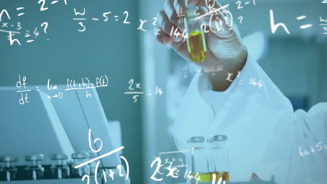 Animation-of-mathematical-equations-over-biracial-male-scientist-working-in-lab