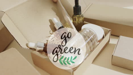 Animation-of-go-green-text-and-leaf-logo-over-organic-beauty-products-in-plain-packaging