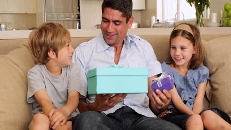 Cute-children-giving-their-father-presents