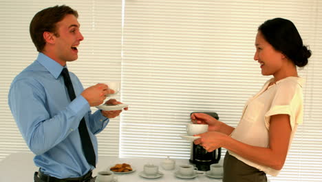 Business-people-having-coffee-in-the-staff-room