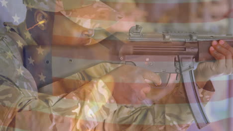 Animation-of-flag-of-usa-over-biracial-male-soldier-shooting-with-rifle