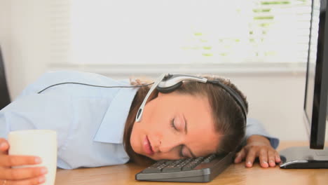 Exhausted-secretary-sleeping-