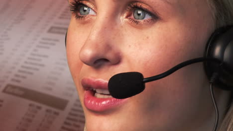 Young-Businesswoman-talking-and-Smiling-on-a-headset