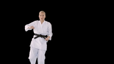 Sporty-woman-practising-karate
