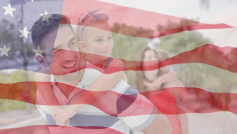 Animation-of-american-flag-over-happy-caucasian-parents-carrying-son-and-daughter-in-sunny-garden