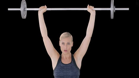 Mujer-Trabajando-Con-Barra-En-El-Gimnasio