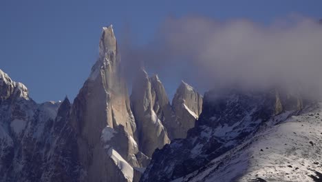 Zoom-in-shot-of-famous-snowy-Cerro-Torre-Mountain-in-Argentina-during-winter