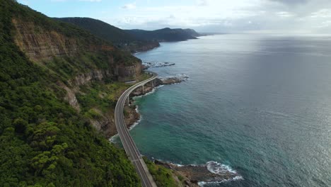 4K-Drone-still-drone-video-showing-the-vast-ocean-underneath-the-sea-cliff-road