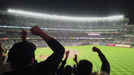 Shot-of-the-moment-of-a-hit-and-RBI-by-the-New-York-Yankees-in-the-last-inning-of-a-regular-season-game-with-the-excitement-of-the-public-in-the-stands