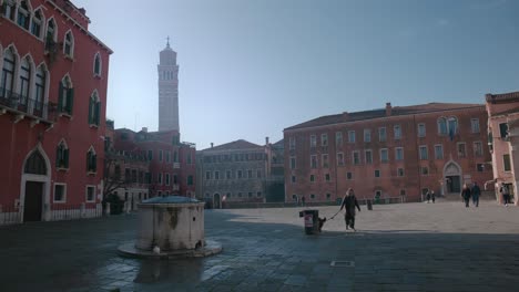 Sunny-day-at-Campo-San-Giovanni-e-Paolo-in-Venice,-Italy,-with-the-Basilica-and-the-surrounding-historic-architecture-in-view