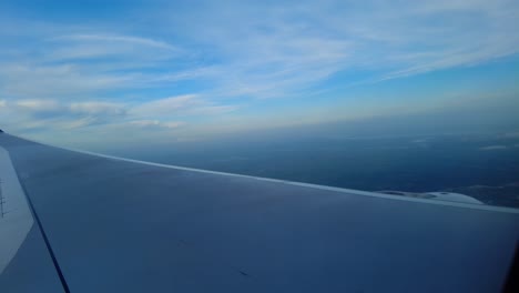 Airplane-flying-over-beautiful-rivers-and-landscape-with-night-sky-in-background