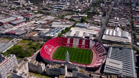 Home-soccer-stadium-of-Huracán-in-Buenos-Aires,-aerial-push-in
