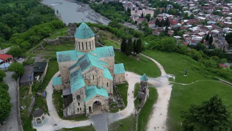 4K-60fps-drone-footage-of-Bagrati-Cathedral-in-Kutaisi,-Georgia,-providing-stunning-aerial-views-of-this-UNESCO-World-Heritage-site