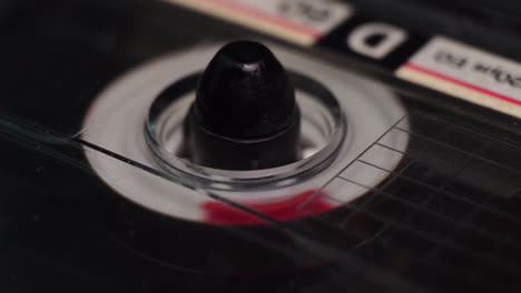 Audio-Cassette-Tape-From-1980s-Playing-or-Recording-From-Start,-Macro-Close-Up-of-Spinning-Reel