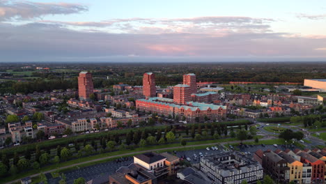 Aerial-view-at-golden-hour-with-modern-buildings-at-Amersfoort-Vathorst,-The-Netherlands