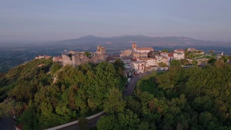 Aerial-orbit-castle-ruins-of-Castel-San-Pietro-Romano,-Italy