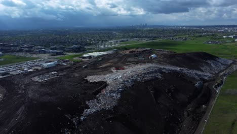 Aerial-View-of-ECCO-Recycling-Dumpyard-with-Calgary-DT-in-Background