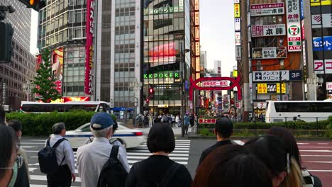 People-lining-up-at-pedestrian-crossing-in-front-of-Kabukicho-Gate-in-Shinjuku