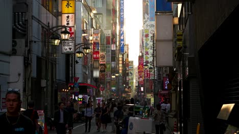 Busy-and-vibrant-streets-of-Tokyo-with-many-people-at-sunset