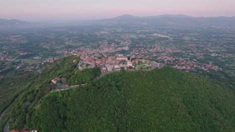 Wide-shot-small-village-overlooking-a-valley,-Castel-San-Pietro-Romano