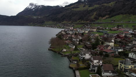 Aerial-View-of-Beckenried-Municipality-on-Coast-of-Lake-Lucerne-Switzerland-on-Cloudy-Day