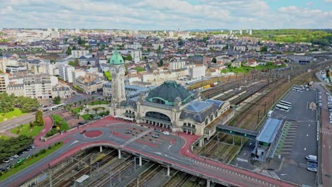 Limoges-Benedictins-station,-France.-Aerial-drone-backward