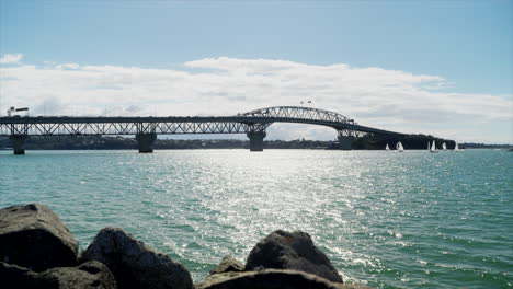 Auckland-Harbour-Bridge-on-a-sunny-day,-New-Zealand