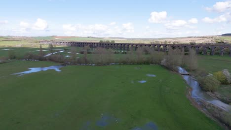 High-drone-footage-towards-Welland-Viaduct-over-the-River-Welland-Northamptonshire-showing-England’s-longest-viaduct-and-valley-below