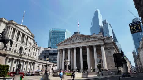 Royal-Exchange-And-Bank-Of-England-In-City-Of-London-With-Skyscrapers-In-Background-On-Sunny-Morning