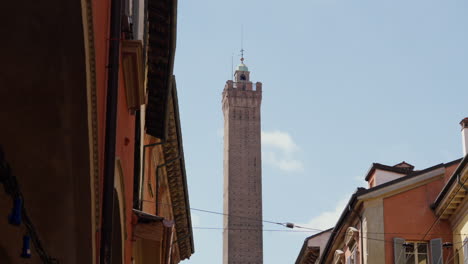 Historic-tower-rises-above-old-Italian-cityscape-in-Bologna