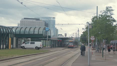 Elderly-man-walks-to-the-tram-in-Vienna