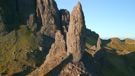 The-Old-Man-of-Storr-ancient-volcanic-plug-slow-orbit-with-reveal-of-crumbling-cliffs