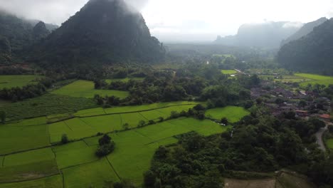 Panoramic-aerial-view-of-the-village-of-Naka,-Laos,-on-a-cloudy-day