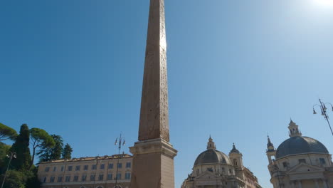 Pan-Up-Reveals-Flaminio-Obelisk-in-Piazza-del-Popolo-on-Typical-Summer-Day