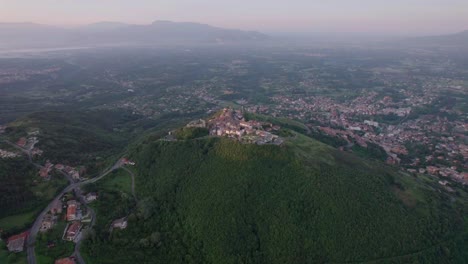 Aerial-orbit-mountain-top-village-at-dawn-Castel-San-Pietro-Romano,-Italy