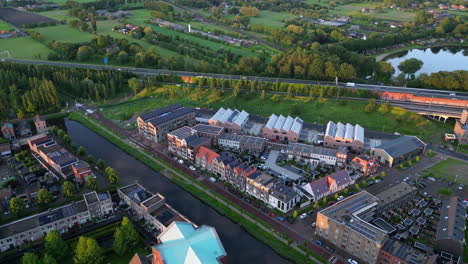 Aerial-view-at-golden-hour-with-modern-buildings-at-Amersfoort-Vathorst,-The-Netherlands