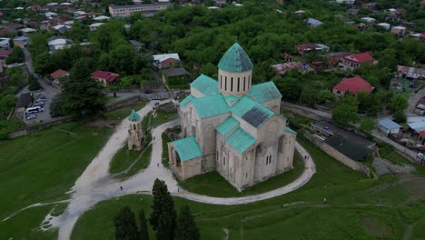Stunning-4K-60fps-drone-footage-captures-Bagrati-Cathedral-in-Kutaisi,-Georgia,-showcasing-its-ancient-architecture-and-scenic-beauty