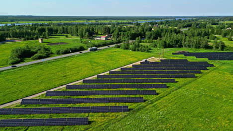 Solar-panel-energy-farm-in-the-European-countryside---aerial-push-in