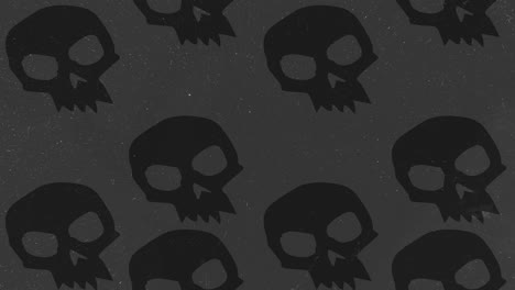 Animación-De-Fondo-De-Halloween-Grandes-Calaveras-Negras-Enojadas-Moviéndose-Hacia-Arriba-Sobre-Fondo-Gris