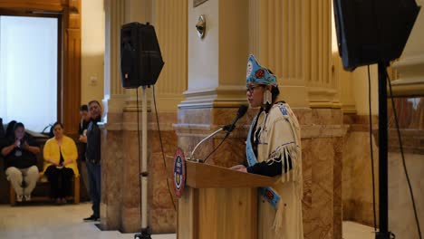 A-teenage-Native-American-princess-gives-a-speech-at-the-Ute-flag-tribute-at-the-Denver-Capitol-building