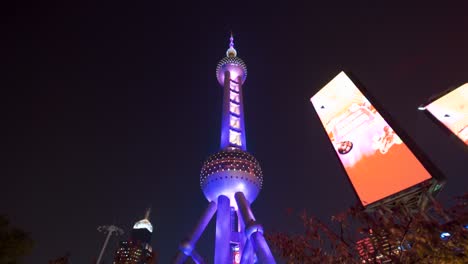 Oriental-Pearl-Radio-and-Television-Tower-illuminated-at-night,-Shanghai,-China