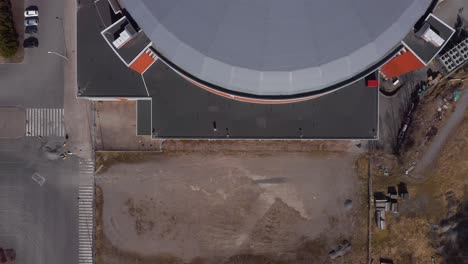 Aerial-top-down-view-moving-accross-the-roof-of-Gatorade-Center