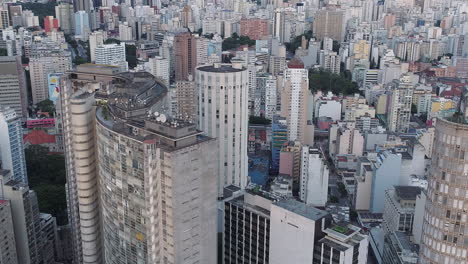 Aerial-view-of-Altino-Arantes-building,-called-Banespao,-Sao-Paulo-downtown,-Brazil
