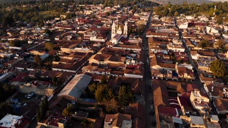 Flying-over-Mazamitla,-Mexico-during-Golden-Hour